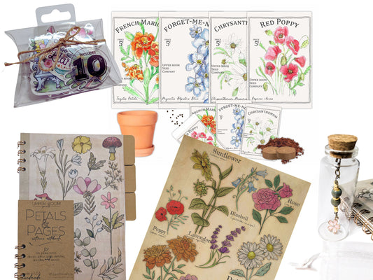 A Garden Party full collection display, featuring floral notebooks, garden-inspired stickers, botanical prints, notebook charms, and a wildflower seed kit