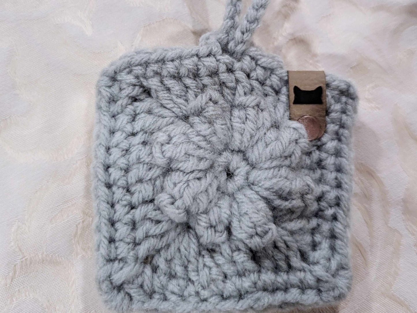 Hand-crocheted Boho Bag Charm in blue tones. A granny square purse accessory designed for bohemian and cottagecore fashion lovers.