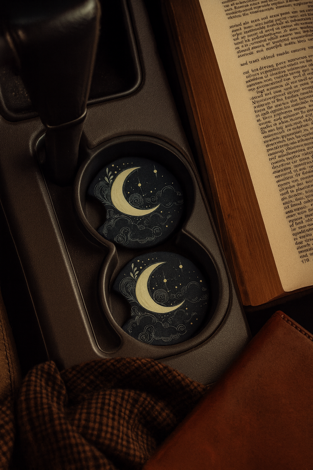 Celestial neoprene car coaster in vehicle cup holder showing fit and cosmic star moon design, set of 2