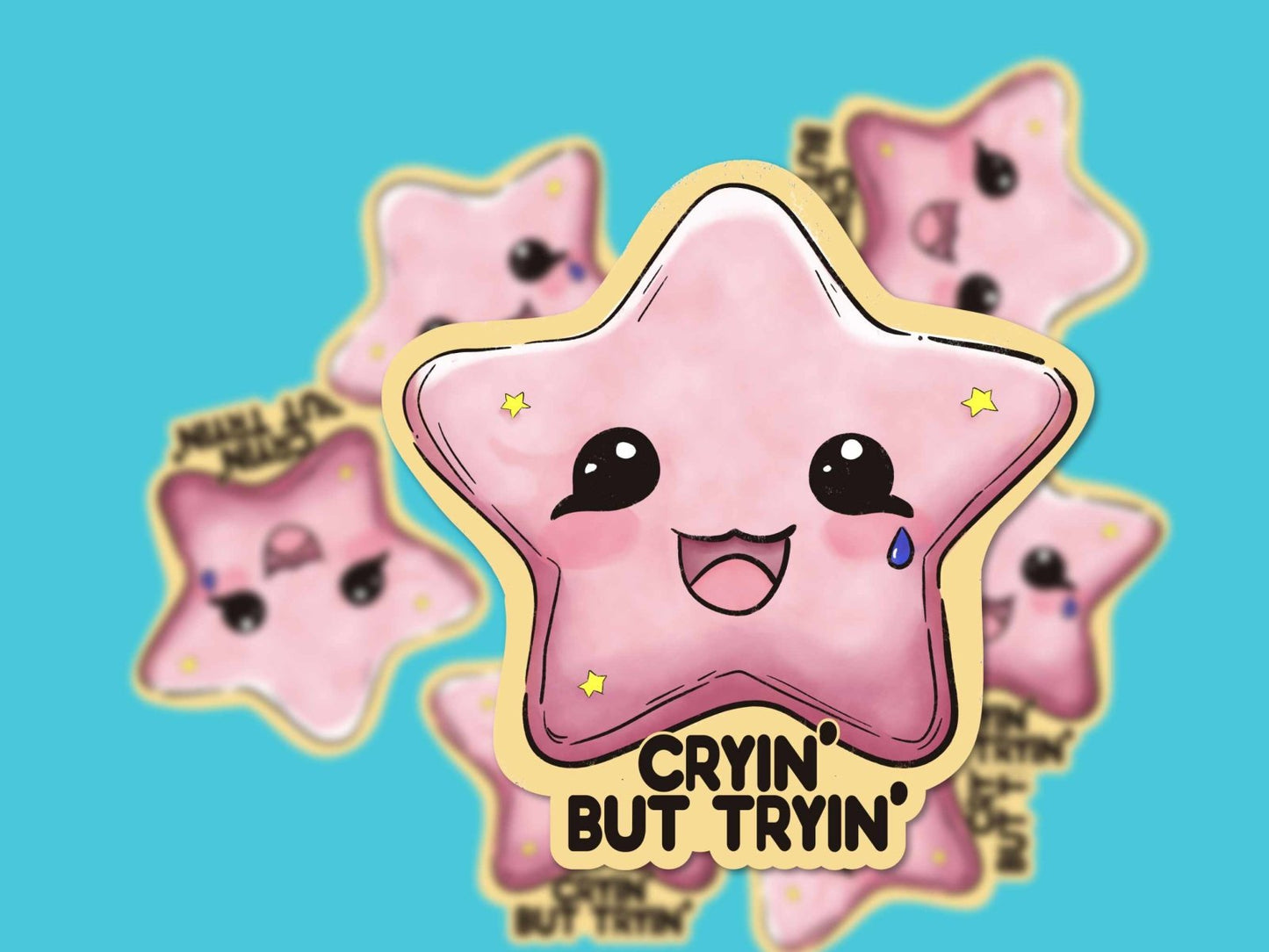 Close-up of the Cryin' but Tryin' Sticker, featuring a hand-drawn pink star on durable weatherproof vinyl