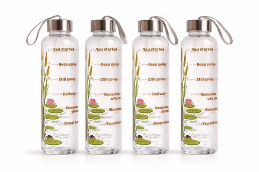 Four transparent water bottles with motivational text and illustrations on a white background