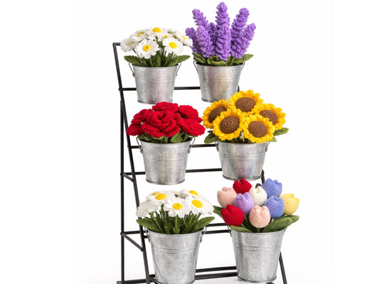 Handmade crochet flower stems displayed together as cozy spring decor