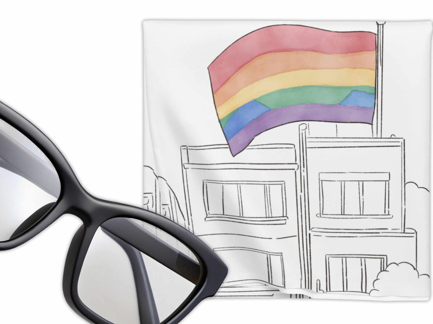 Rainbow pride flag waving above a simple black-and-white building illustration on microfiber cloth