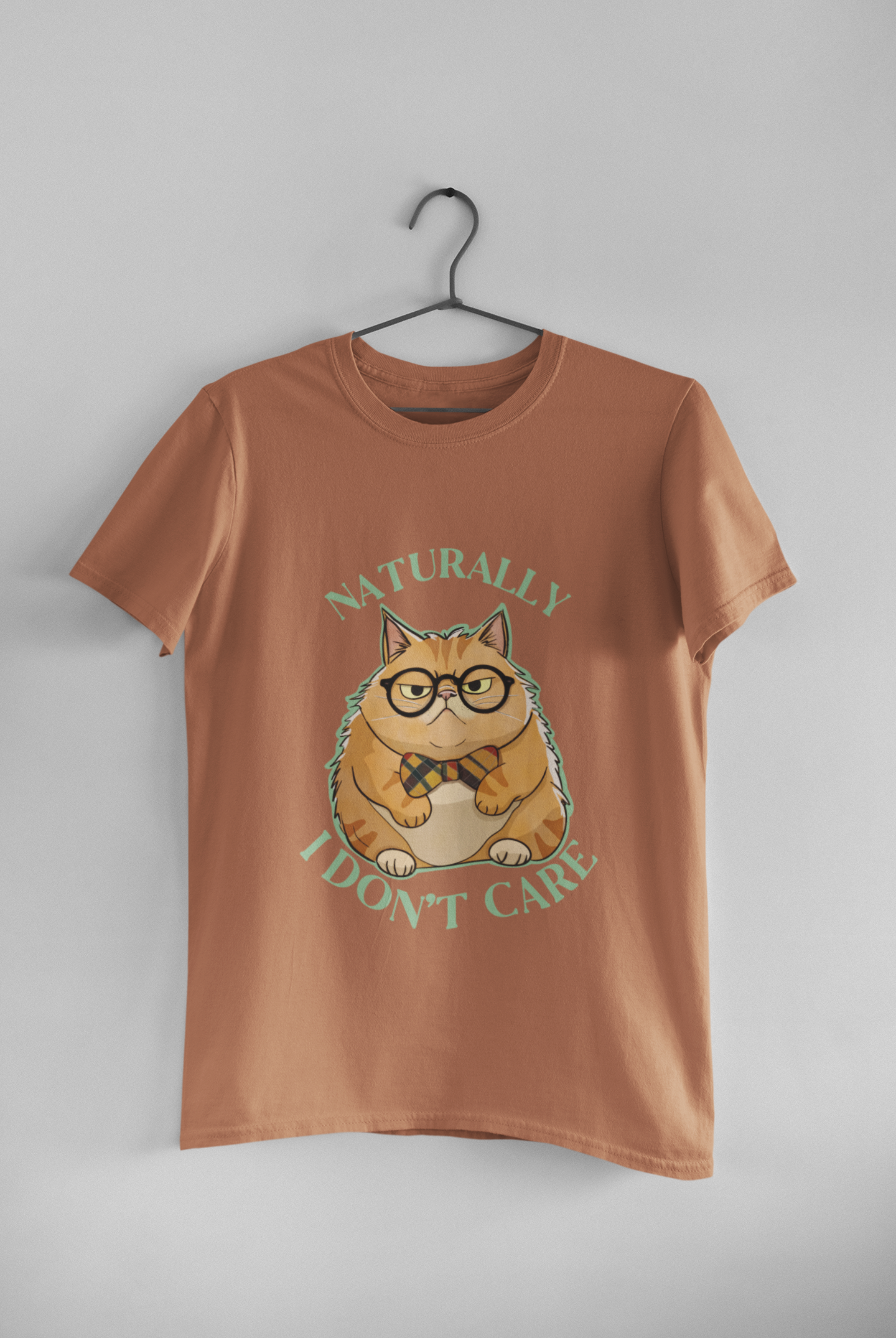 Naturally I Don't Care orange cat t-shirt in terracotta rust color, unisex sizing