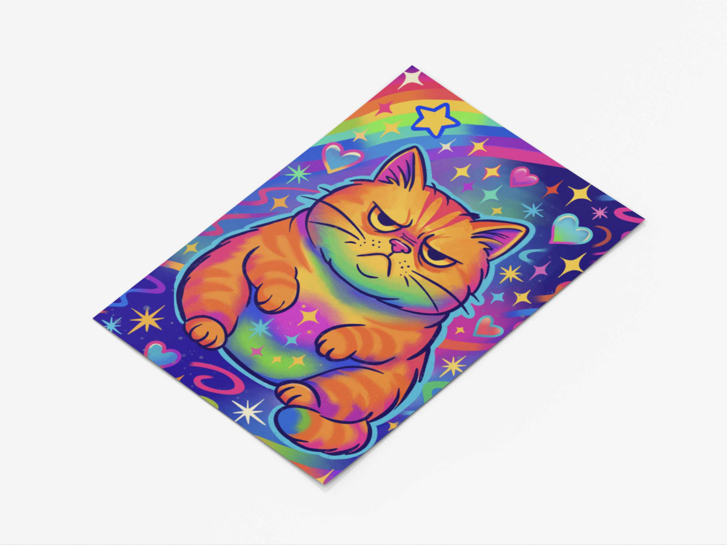 Angled view of 5x7 art print featuring an unimpressed orange tabby cat with rainbow and star-filled background