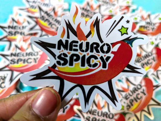 Neurospicy Pepper Sticker being held between fingers, showcasing its compact 3-inch size and bold red pepper design.