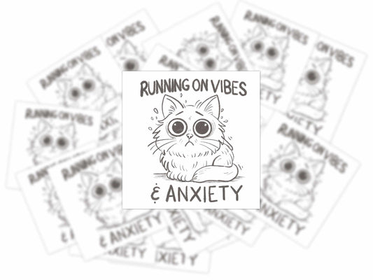Stack of Running on Vibes & Anxiety vinyl stickers featuring a wide-eyed anxious cat illustration.