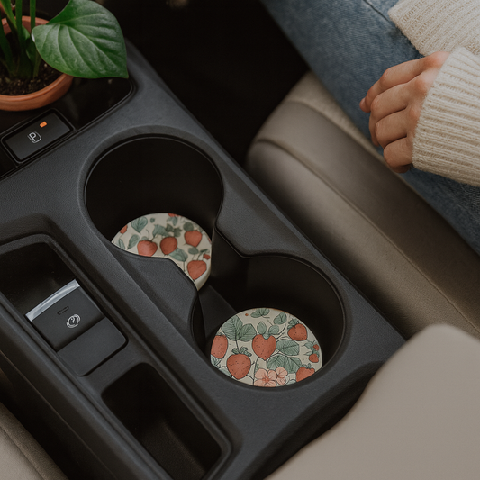 Strawberry neoprene car coaster in vehicle cup holder showing fit and hand-drawn design, set of 2