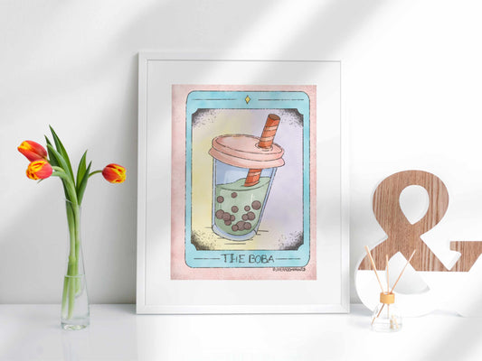 Tarot Boba Print framed on display, showing a whimsical matcha boba tea illustration in tarot card style