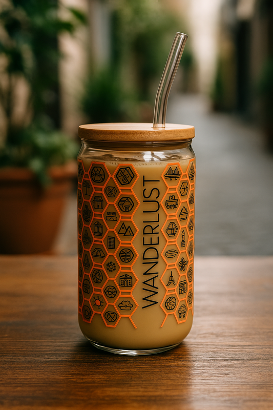 Wanderlust glass tumbler angle view with natural bamboo lid and reusable glass straw for eco-friendly drinking