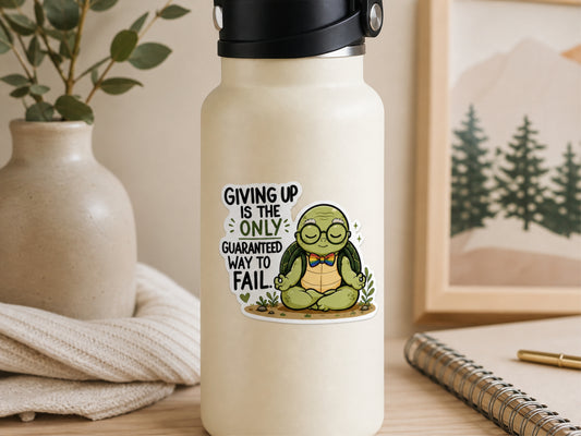 Wilbur turtle quote sticker on a cream water bottle reading “Giving up is the only guaranteed way to fail”