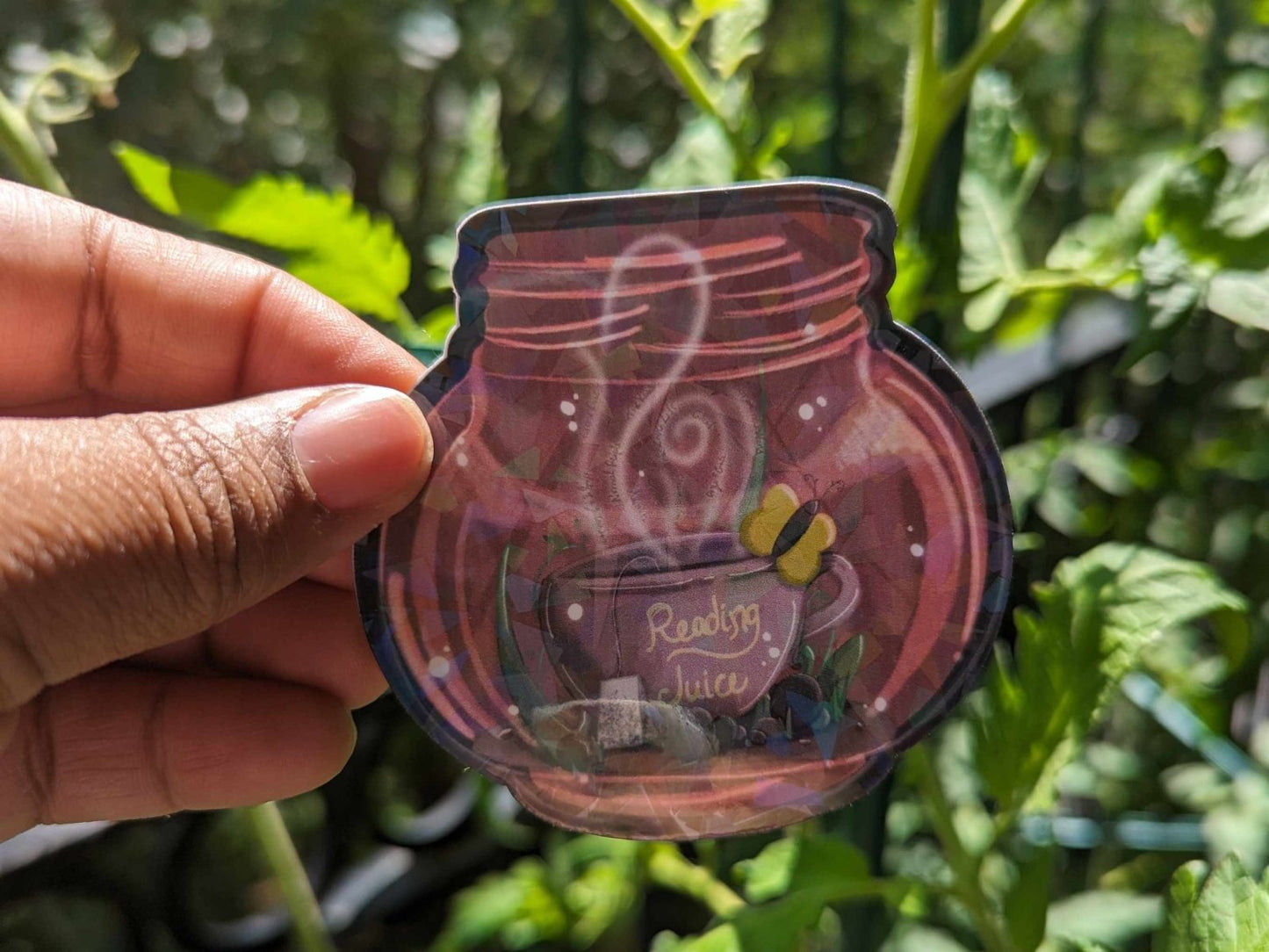 Round glow jar sticker with a whimsical, glowing holographic effect.