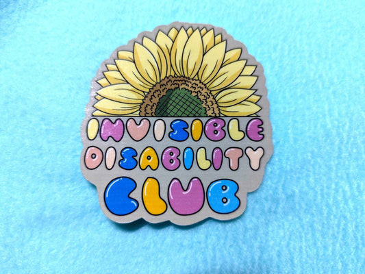 Close-up of the Invisible Disability Club Sticker, highlighting its hand-drawn sunflower design and high-quality waterproof finish