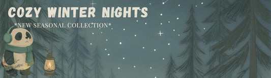 Cozy Winter Nights new seasonal collection banner featuring Wonton the panda with mint green headphones and scarf holding lantern in snowy winter forest with evergreen trees
