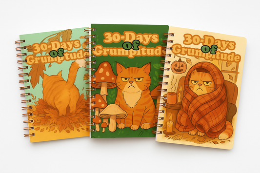 Three spiral-bound notebooks titled “30-Days of Grumptitude,” each with a different autumn-themed cover illustration of a grumpy orange cat in various poses and settings.