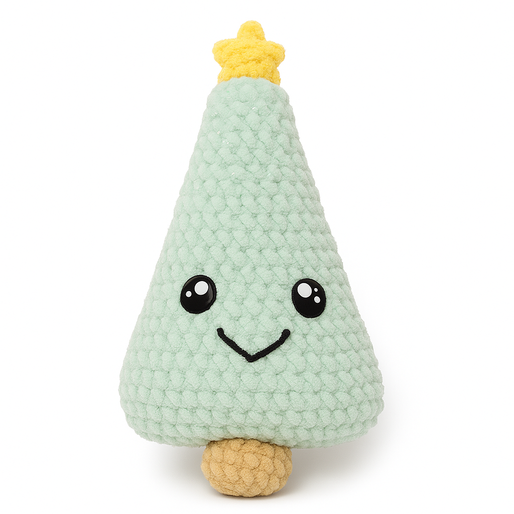 Mint green handmade crochet Christmas tree plushie featuring yellow star topper, embroidered eyes and smile, and cozy knit construction