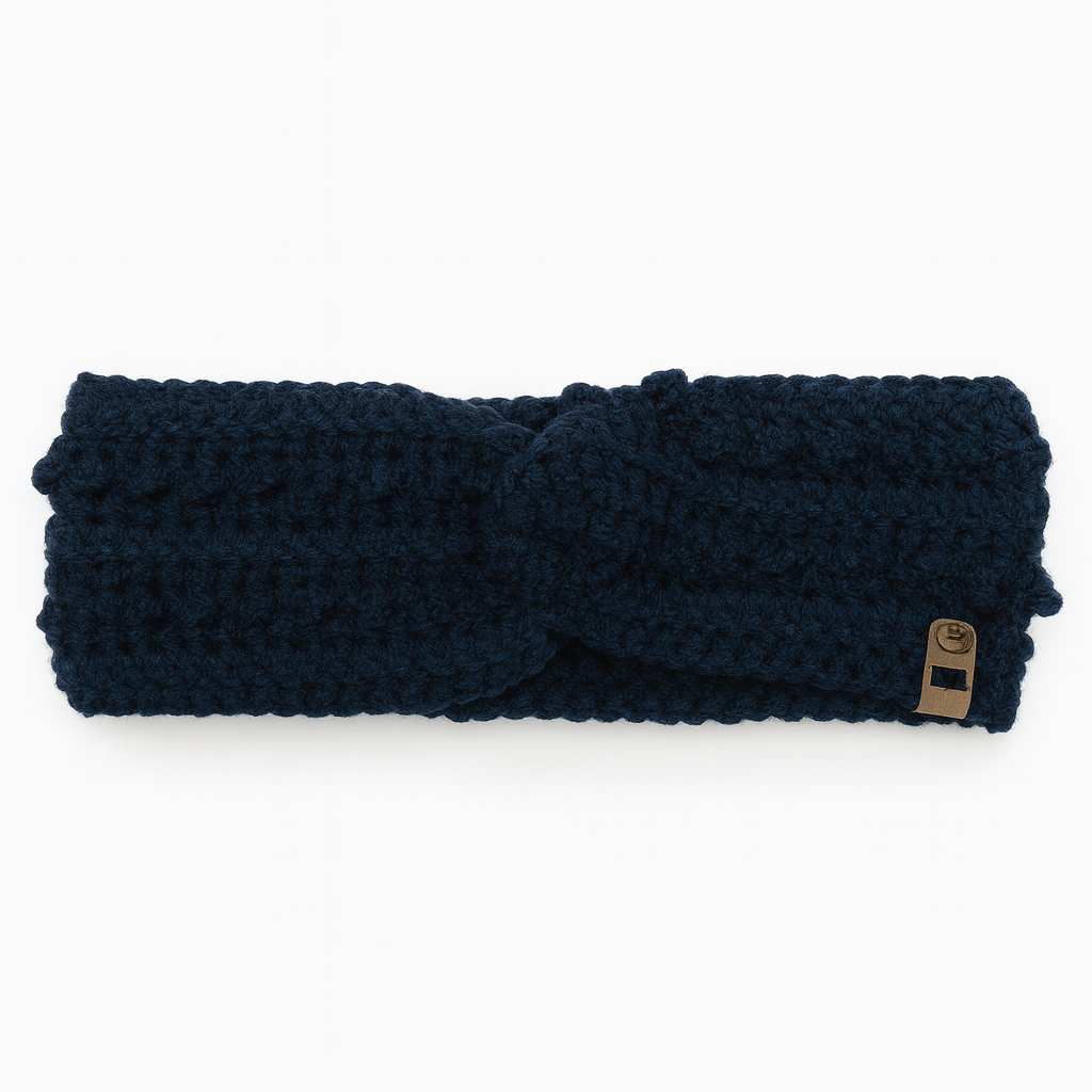 Rich Blue crochet ear warmers in solid navy blue knit with leather accent detail
