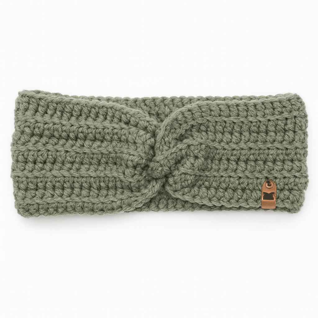 Sage Green crochet ear warmers in soft muted green knit with textured cable pattern and leather detail