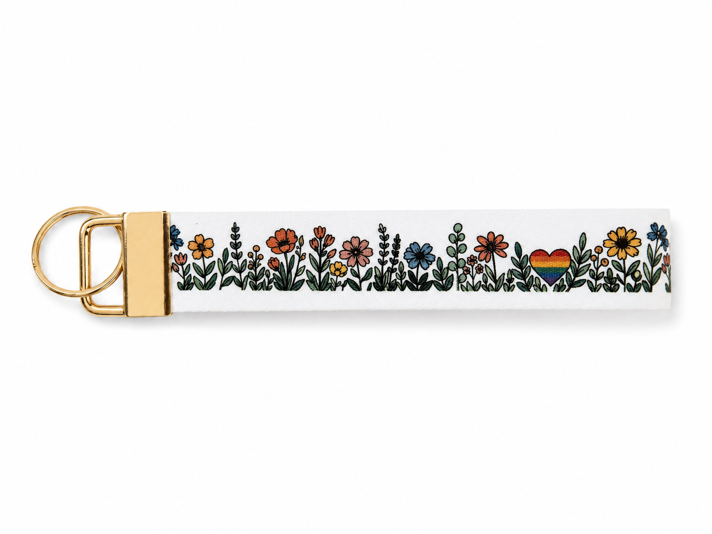 Keychain with floral design and rainbow heart on a white background