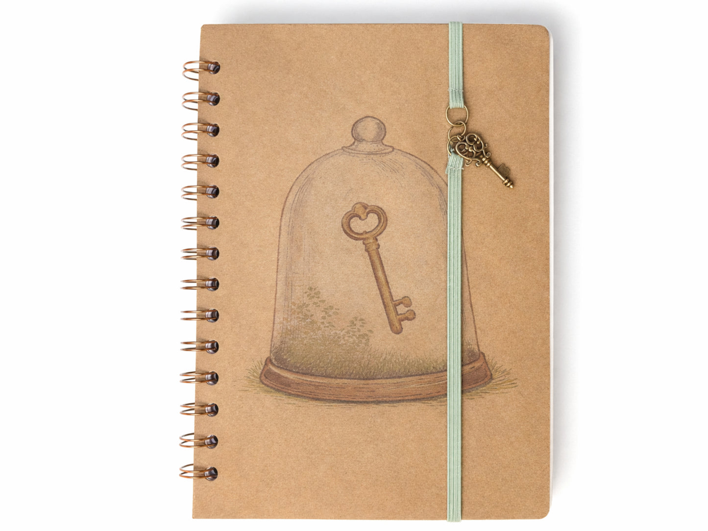 Notebook with a key and bell jar design on the cover, featuring a gold key charm.