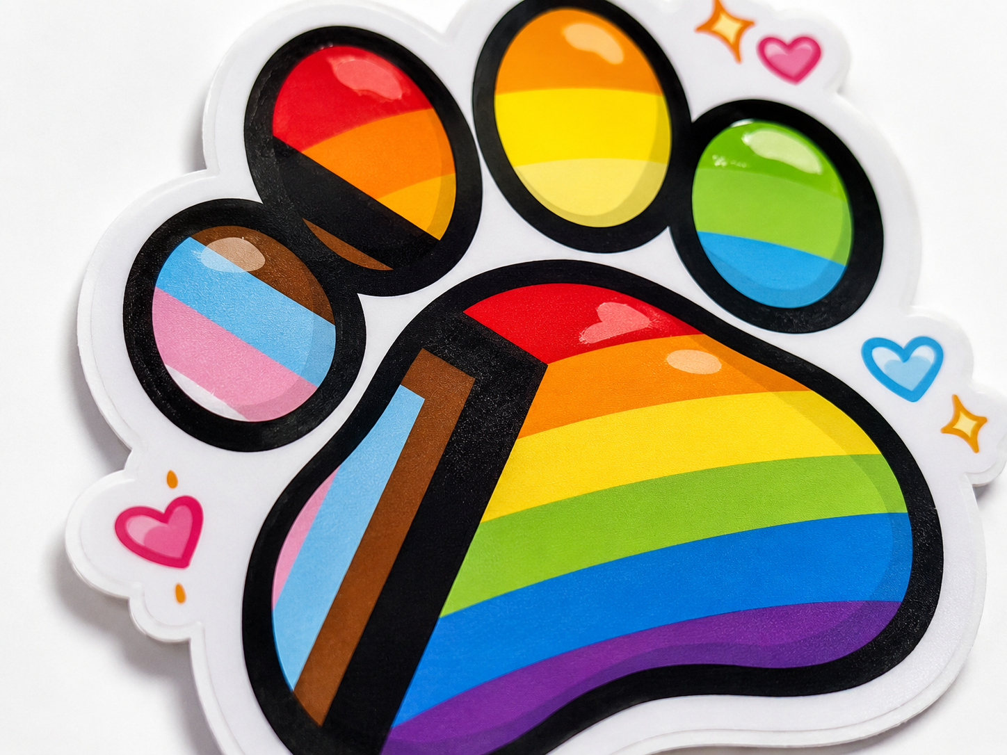 Colorful paw print design with rainbow colors on a white background