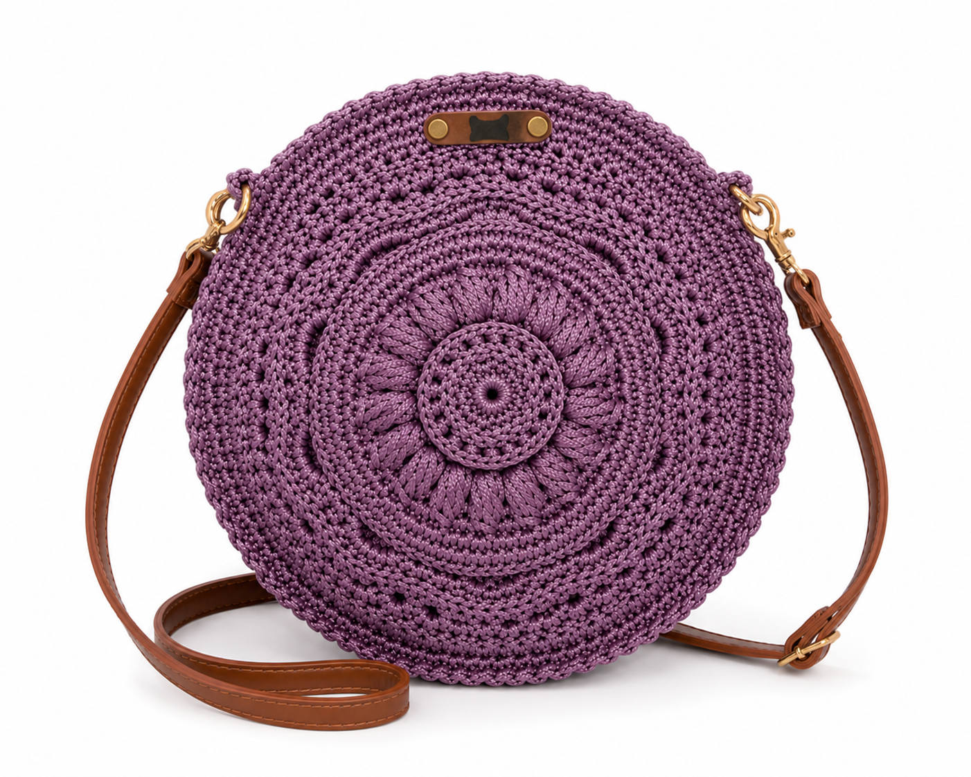 Purple crocheted round bag with brown strap on a white background
