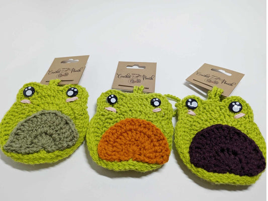 Three handmade crochet Frog Pouch Bag Charms in green with purple, orange, and green tummies displayed together