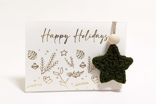 Gold foil boho star card with green crochet ornament, handmade holiday collection piece