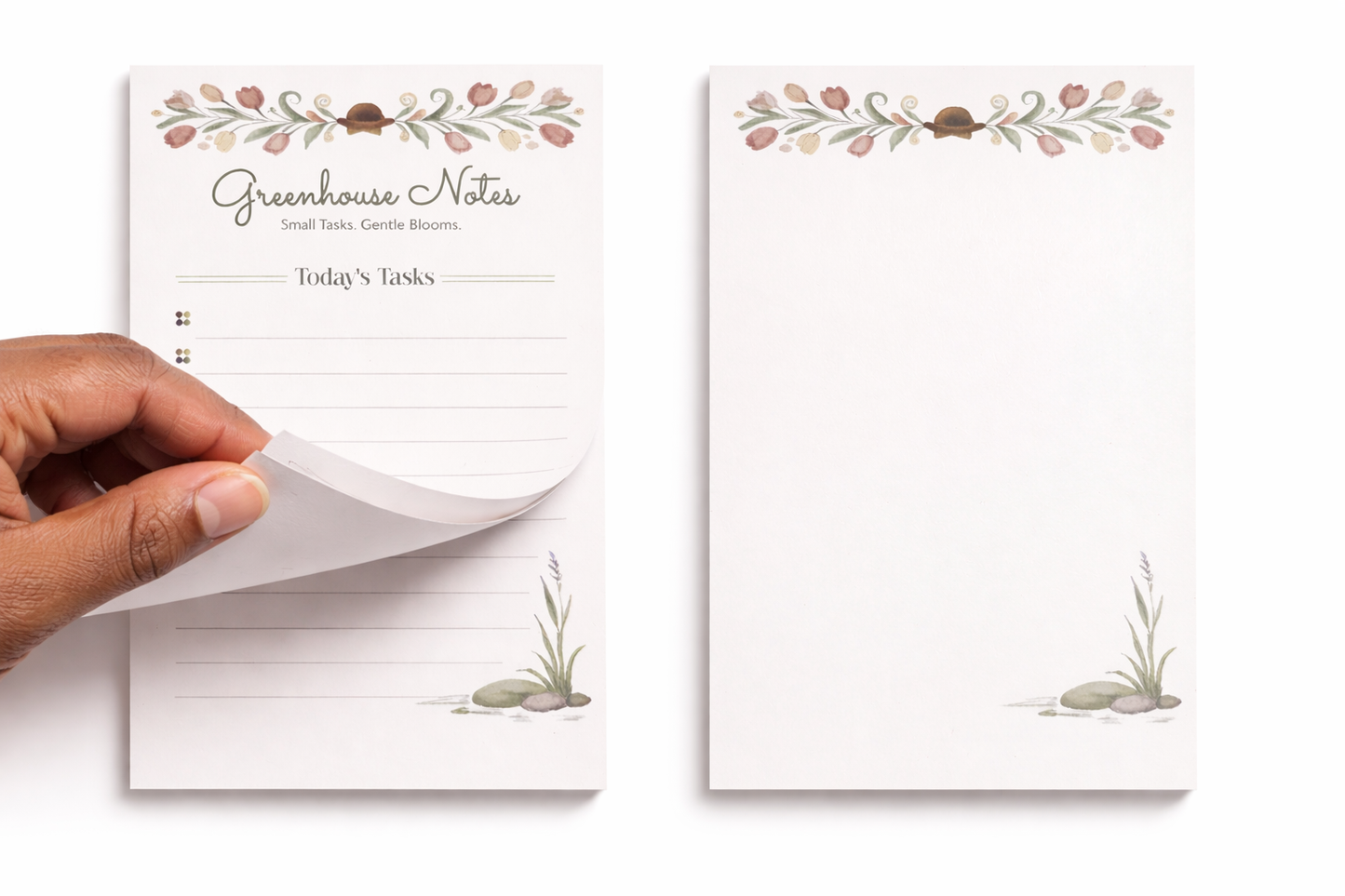Hand holding a notepad with 'Greenhouse Notes' branding on a white background