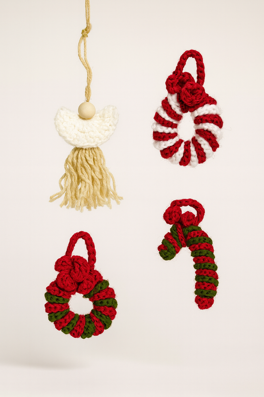 Set of handmade crochet Christmas ornaments including angel, candy cane, and red white wreaths on neutral background