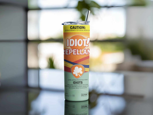 Idiot Repellant 20oz insulated skinny tumbler with funny text design, front view with clear straw
