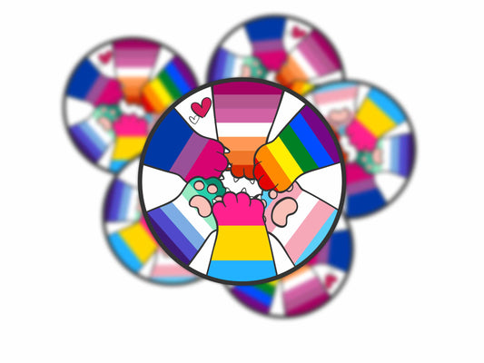 LGBTQ Kitty Power vinyl sticker featuring cat paws in a circle, each wrapped in a different pride flag, with floating hearts
