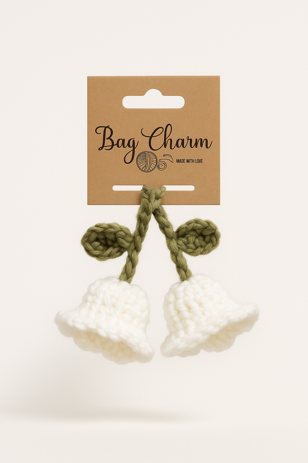 Crochet lily of the valley bag charm with white flowers, adorable handmade keychain for nature lovers